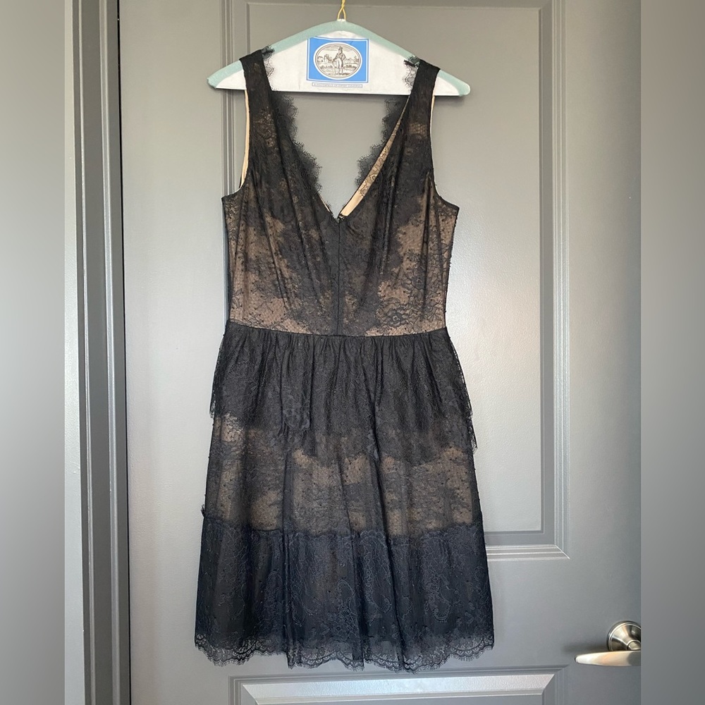 BCBGMaxAzria black lace mini dress. Worn a few times. In great condition.